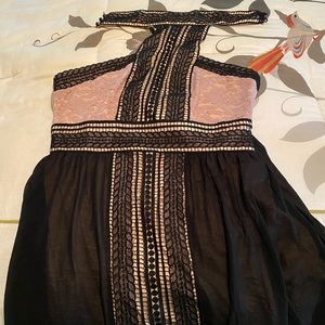 Beautiful Venus halter dress.. hits right above the knee. XL fits size 14.